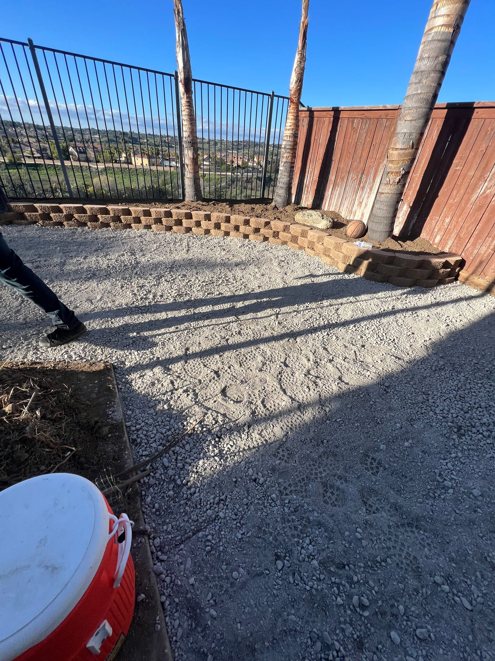 Backyard groundwork and paver border