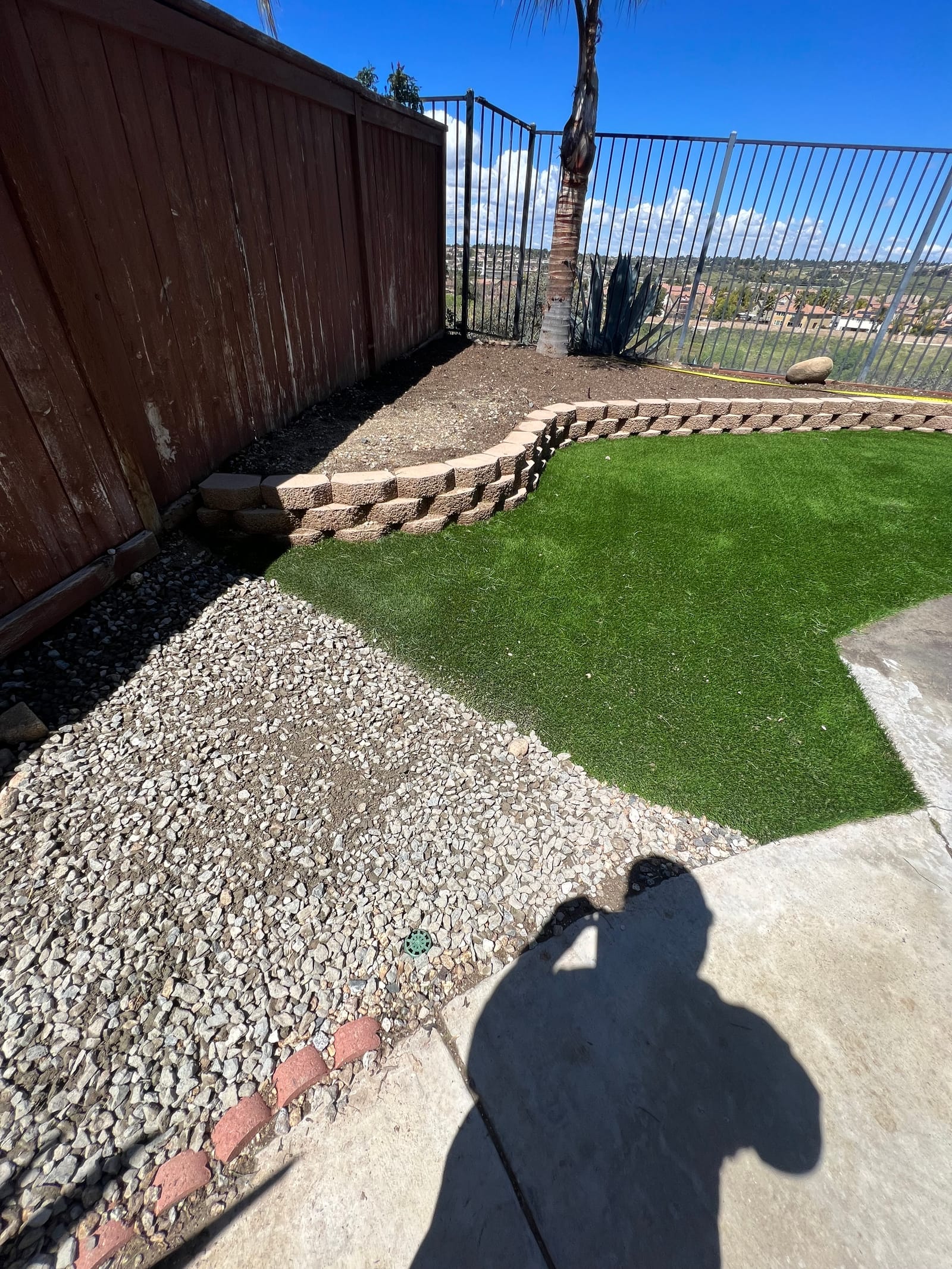 Block retaining wall with landscaping