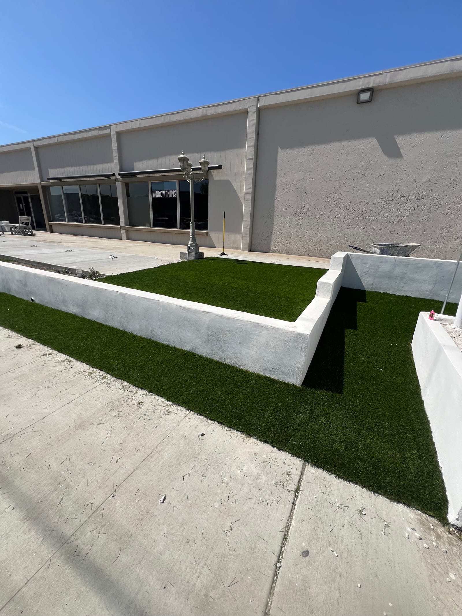 Finished retaining wall and turf